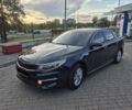 Черный Киа K5, объемом двигателя 2 л и пробегом 226 тыс. км за 12000 $, фото 5 на Automoto.ua