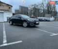 Черный Киа K5, объемом двигателя 2 л и пробегом 230 тыс. км за 13499 $, фото 1 на Automoto.ua