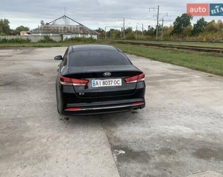 Черный Киа K5, объемом двигателя 2 л и пробегом 298 тыс. км за 11000 $, фото 3 на Automoto.ua