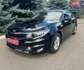 Черный Киа K5, объемом двигателя 2 л и пробегом 328 тыс. км за 11990 $, фото 1 на Automoto.ua