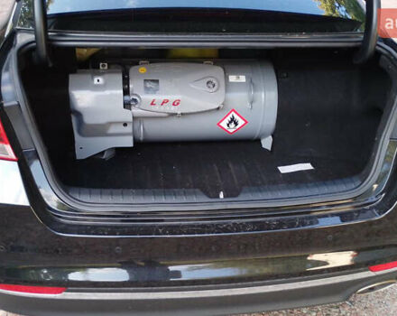 Чорний Кіа K5, об'ємом двигуна 2 л та пробігом 258 тис. км за 13500 $, фото 2 на Automoto.ua