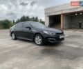Черный Киа K5, объемом двигателя 2 л и пробегом 298 тыс. км за 11000 $, фото 1 на Automoto.ua