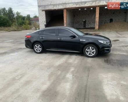 Черный Киа K5, объемом двигателя 2 л и пробегом 298 тыс. км за 11000 $, фото 2 на Automoto.ua