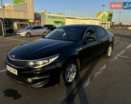 Черный Киа K5, объемом двигателя 2 л и пробегом 270 тыс. км за 12000 $, фото 1 на Automoto.ua