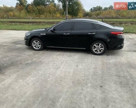 Черный Киа K5, объемом двигателя 2 л и пробегом 298 тыс. км за 11000 $, фото 6 на Automoto.ua