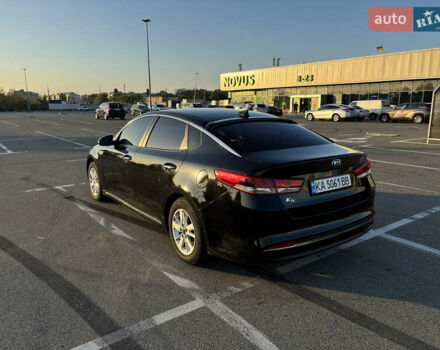 Черный Киа K5, объемом двигателя 2 л и пробегом 270 тыс. км за 12000 $, фото 3 на Automoto.ua