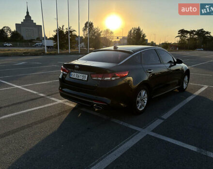 Черный Киа K5, объемом двигателя 2 л и пробегом 270 тыс. км за 12000 $, фото 6 на Automoto.ua