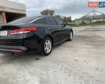 Черный Киа K5, объемом двигателя 2 л и пробегом 298 тыс. км за 11000 $, фото 4 на Automoto.ua