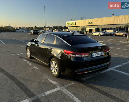 Черный Киа K5, объемом двигателя 2 л и пробегом 270 тыс. км за 12000 $, фото 4 на Automoto.ua