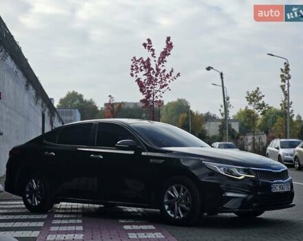 Черный Киа K5, объемом двигателя 2 л и пробегом 173 тыс. км за 14500 $, фото 1 на Automoto.ua