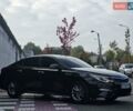 Черный Киа K5, объемом двигателя 2 л и пробегом 173 тыс. км за 14500 $, фото 1 на Automoto.ua