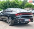 Черный Киа K5, объемом двигателя 2 л и пробегом 155 тыс. км за 20790 $, фото 6 на Automoto.ua