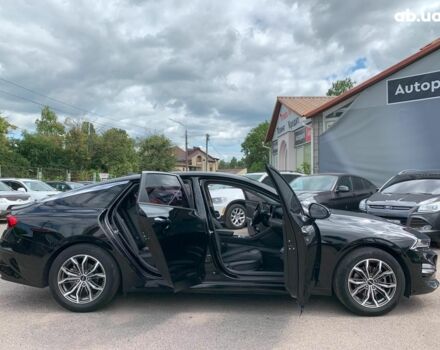 Чорний Кіа K5, об'ємом двигуна 2 л та пробігом 155 тис. км за 21290 $, фото 14 на Automoto.ua