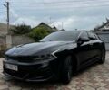 Черный Киа K5, объемом двигателя 2 л и пробегом 106 тыс. км за 26500 $, фото 1 на Automoto.ua
