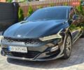 Чорний Кіа K5, об'ємом двигуна 2 л та пробігом 171 тис. км за 19500 $, фото 1 на Automoto.ua