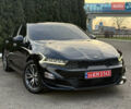 Черный Киа K5, объемом двигателя 2 л и пробегом 137 тыс. км за 22900 $, фото 1 на Automoto.ua