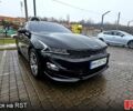 Черный Киа K5, объемом двигателя 2 л и пробегом 145 тыс. км за 21500 $, фото 1 на Automoto.ua