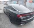Черный Киа K5, объемом двигателя 1.6 л и пробегом 110 тыс. км за 13300 $, фото 3 на Automoto.ua