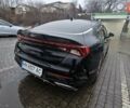 Черный Киа K5, объемом двигателя 2 л и пробегом 145 тыс. км за 21500 $, фото 7 на Automoto.ua