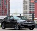 Черный Киа K5, объемом двигателя 1.6 л и пробегом 112 тыс. км за 20450 $, фото 1 на Automoto.ua