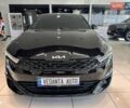 Черный Киа K5, объемом двигателя 2 л и пробегом 171 тыс. км за 21900 $, фото 1 на Automoto.ua