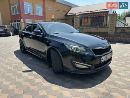 Черный Киа K5, объемом двигателя 2 л и пробегом 234 тыс. км за 7999 $, фото 1 на Automoto.ua