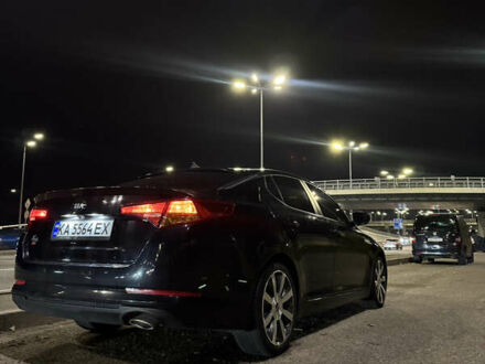 Черный Киа K5, объемом двигателя 2 л и пробегом 284 тыс. км за 9450 $, фото 1 на Automoto.ua