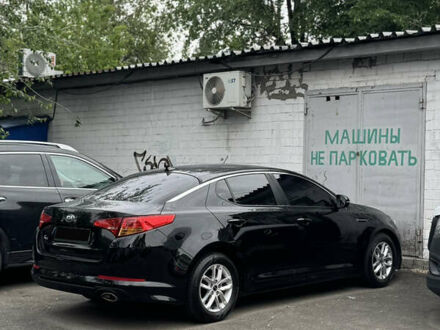 Черный Киа K5, объемом двигателя 2 л и пробегом 445 тыс. км за 6500 $, фото 1 на Automoto.ua