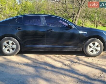 Черный Киа K5, объемом двигателя 2 л и пробегом 272 тыс. км за 7500 $, фото 1 на Automoto.ua