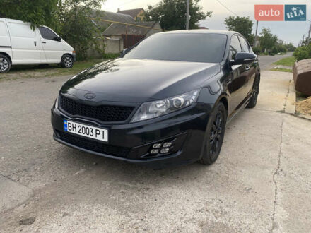 Черный Киа K5, объемом двигателя 2 л и пробегом 200 тыс. км за 8000 $, фото 1 на Automoto.ua