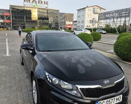 Черный Киа K5, объемом двигателя 2 л и пробегом 408 тыс. км за 6400 $, фото 1 на Automoto.ua