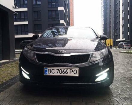 Черный Киа K5, объемом двигателя 2 л и пробегом 255 тыс. км за 10400 $, фото 1 на Automoto.ua