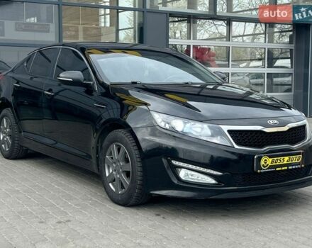 Черный Киа K5, объемом двигателя 2 л и пробегом 280 тыс. км за 9100 $, фото 1 на Automoto.ua