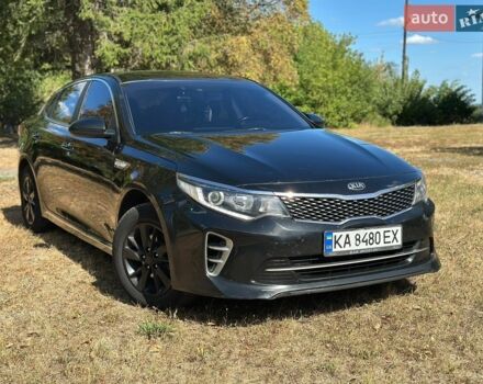 Черный Киа K5, объемом двигателя 2 л и пробегом 267 тыс. км за 10300 $, фото 1 на Automoto.ua