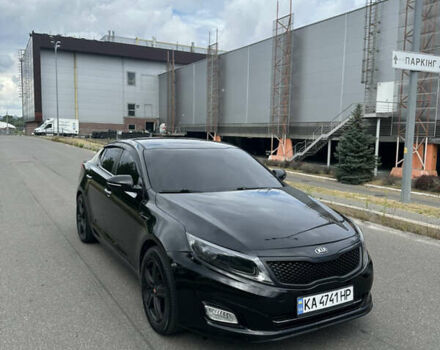 Черный Киа K5, объемом двигателя 2 л и пробегом 326 тыс. км за 10200 $, фото 1 на Automoto.ua