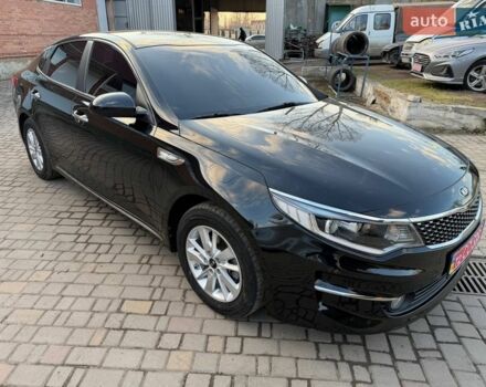 Черный Киа K5, объемом двигателя 2 л и пробегом 214 тыс. км за 11999 $, фото 1 на Automoto.ua