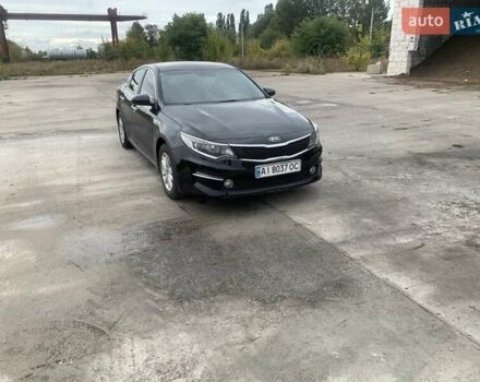 Черный Киа K5, объемом двигателя 2 л и пробегом 298 тыс. км за 11000 $, фото 1 на Automoto.ua