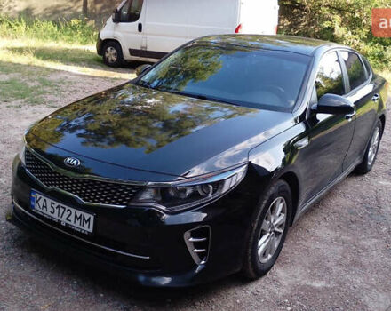 Черный Киа K5, объемом двигателя 2 л и пробегом 258 тыс. км за 13500 $, фото 1 на Automoto.ua