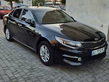 Черный Киа K5, объемом двигателя 2 л и пробегом 259 тыс. км за 13000 $, фото 1 на Automoto.ua