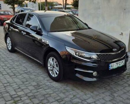 Черный Киа K5, объемом двигателя 2 л и пробегом 259 тыс. км за 13000 $, фото 1 на Automoto.ua