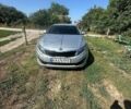 Серый Киа K5, объемом двигателя 2 л и пробегом 263 тыс. км за 7300 $, фото 1 на Automoto.ua