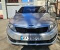 Серый Киа K5, объемом двигателя 2 л и пробегом 234 тыс. км за 9500 $, фото 1 на Automoto.ua