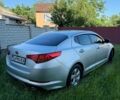 Серый Киа K5, объемом двигателя 2 л и пробегом 230 тыс. км за 7500 $, фото 1 на Automoto.ua