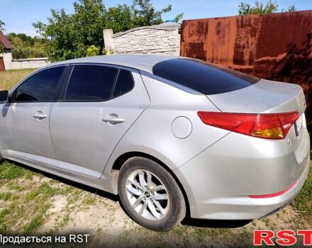 Серый Киа K5, объемом двигателя 2 л и пробегом 248 тыс. км за 7500 $, фото 2 на Automoto.ua