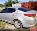 Серый Киа K5, объемом двигателя 2 л и пробегом 248 тыс. км за 7500 $, фото 2 на Automoto.ua