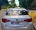 Серый Киа K5, объемом двигателя 2 л и пробегом 250 тыс. км за 9000 $, фото 1 на Automoto.ua