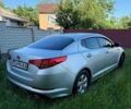 Серый Киа K5, объемом двигателя 2 л и пробегом 230 тыс. км за 7900 $, фото 1 на Automoto.ua