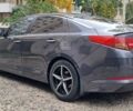 Серый Киа K5, объемом двигателя 2 л и пробегом 160 тыс. км за 9500 $, фото 9 на Automoto.ua