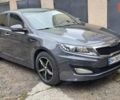 Серый Киа K5, объемом двигателя 2 л и пробегом 160 тыс. км за 9500 $, фото 1 на Automoto.ua