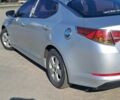 Серый Киа K5, объемом двигателя 2 л и пробегом 119 тыс. км за 6500 $, фото 1 на Automoto.ua